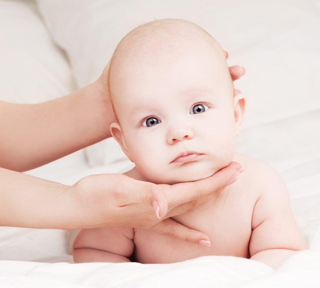 Why do babies have neck curvatures?